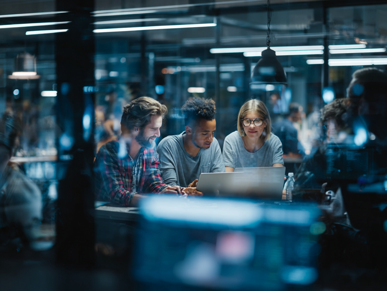 Researchers annotating insights on a tablet